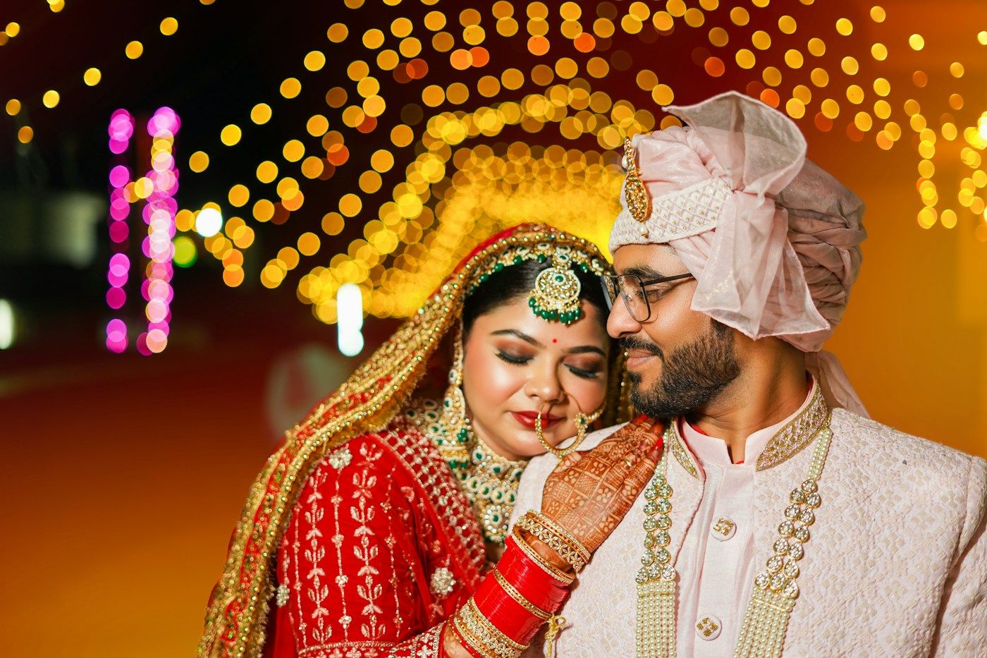 Aarav and Meera smiling together, dressed for their wedding
